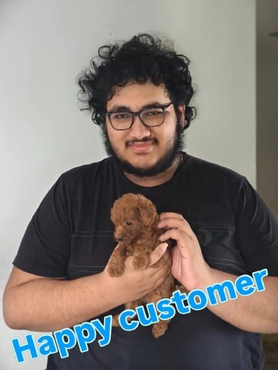 Happy customer with puppy 1
